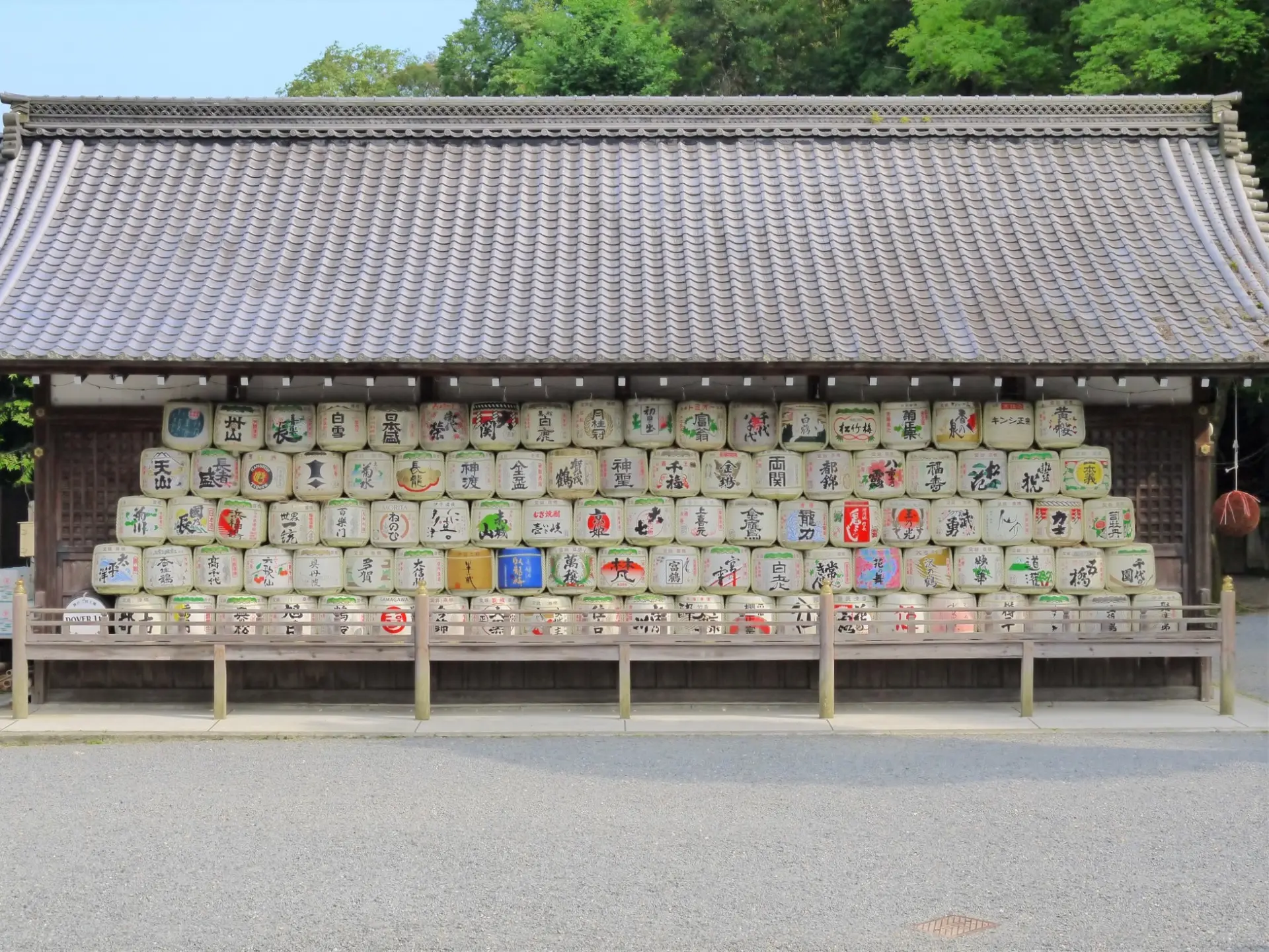 A stunning sight of sake barrels dedicated to the shrine