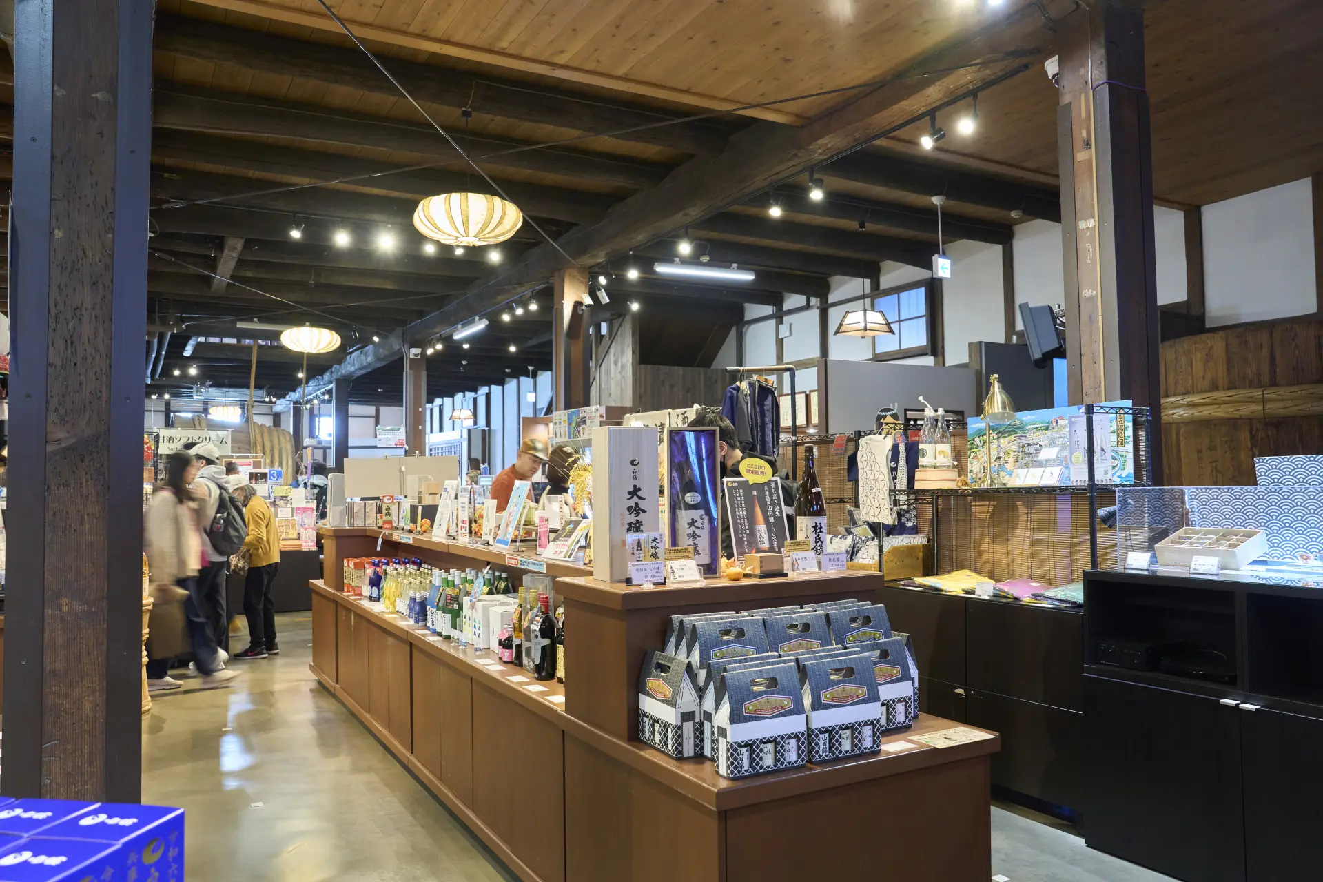 The shop features a wide variety of souvenirs, from sake to specialty goods.