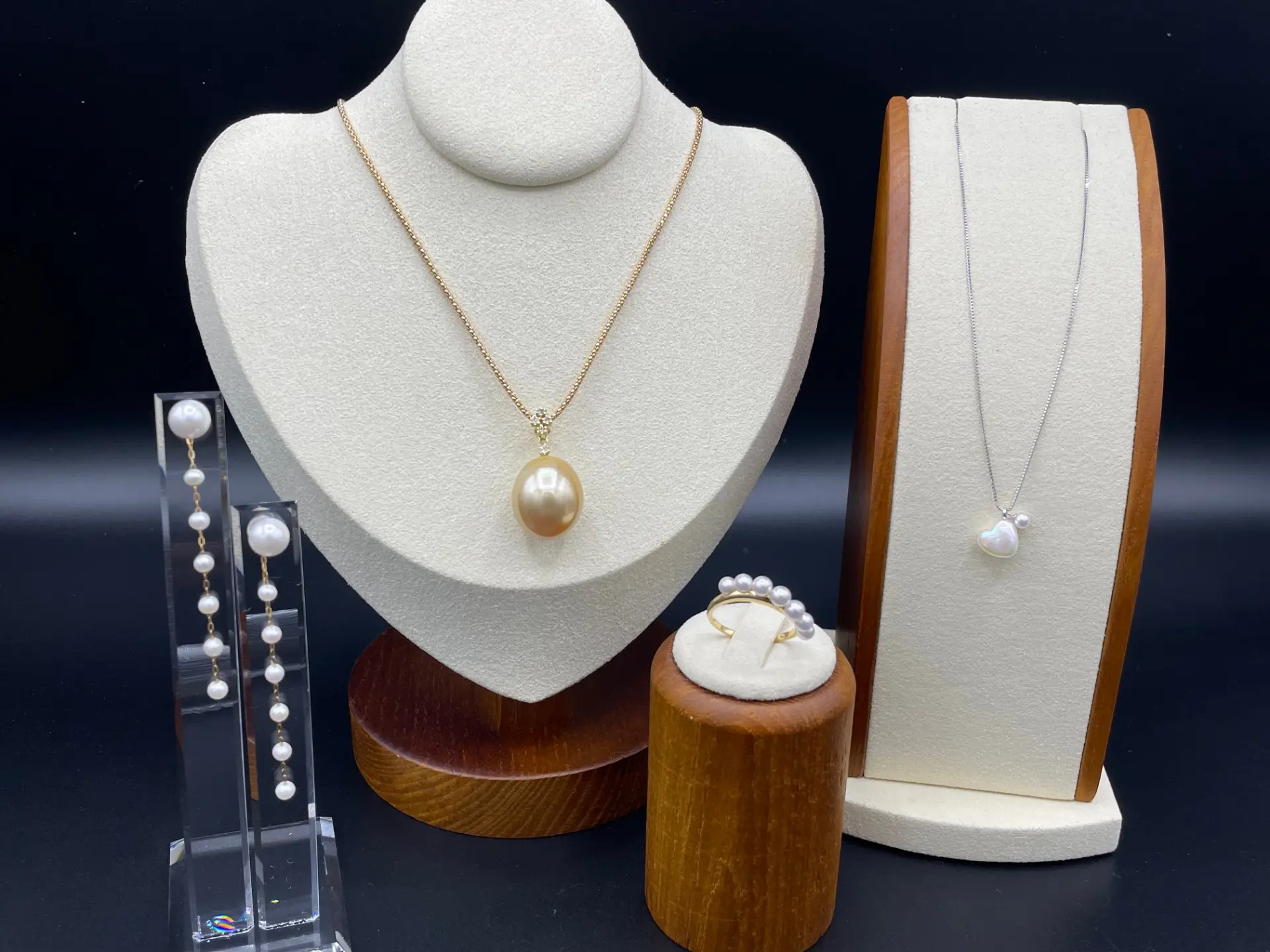 Elegant accessories adorned with large, lustrous pearls that radiate a beautiful sheen.