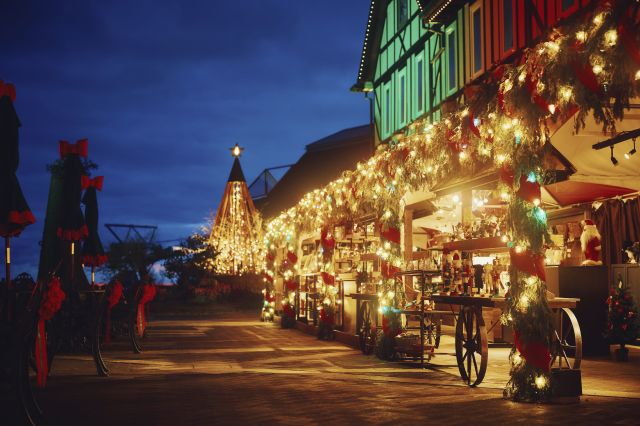 Kobe Christmas Market - Christmas at the Castle - features a 6-meter wooden Christmas tower, authentic German ornaments, advent calendars, nutcrackers, and smoking man dolls.